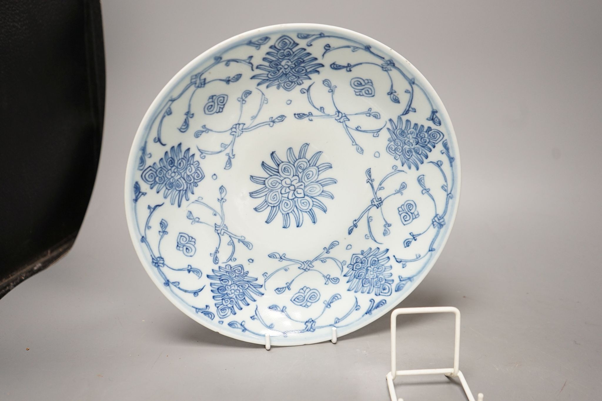An 18th century Chinese blue and white bottle vase and two 19th century blue and white plates, diameter of largest plate - 25cm